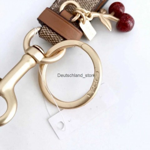 Cherry Designer Luxury Keychains with Golden Chain and Pink Crystal