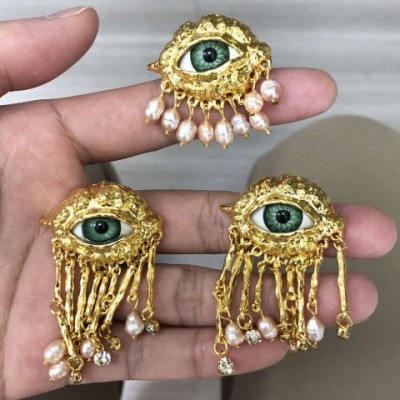 Women's Vintage Demon Eyes Exaggerated Clip-on Earrings with Imitated Pearl Tassels