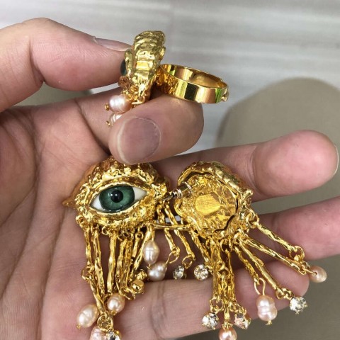 Women's Vintage Demon Eyes Exaggerated Clip-on Earrings with Imitated Pearl Tassels
