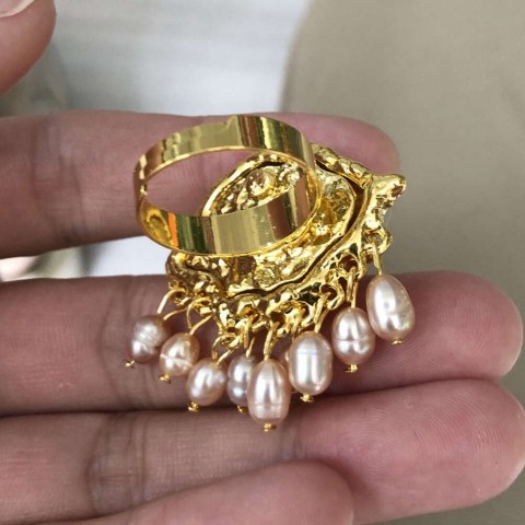 Women's Vintage Demon Eyes Exaggerated Clip-on Earrings with Imitated Pearl Tassels